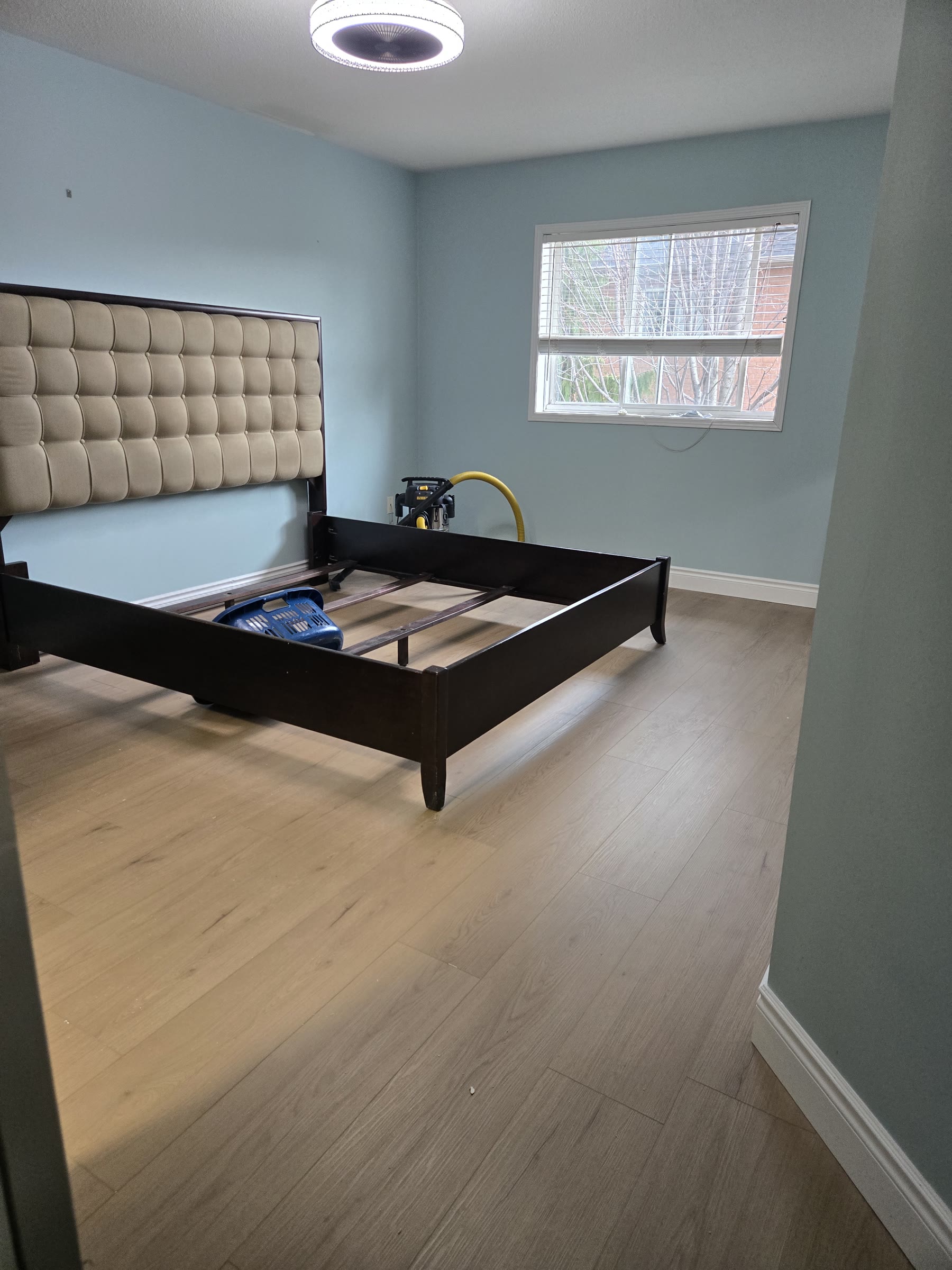 Finished bedroom showing coordinated wall colour, flooring and trim